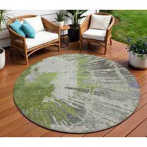 Photo of 8' Olive Green Artichoke Green And Fern Green Round Abstract Washable Indoor Outdoor Area Rug