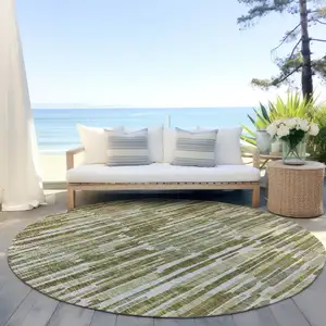 Photo of 8' Olive Green Brown And Beige Round Abstract Washable Indoor Outdoor Area Rug