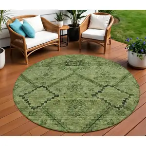 Photo of 8' Olive Green Fern Green And Artichoke Green Round Floral Washable Indoor Outdoor Area Rug