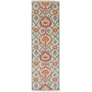 Photo of 8' Orange And Gray Wool Floral Hand Knotted Stain Resistant Runner Rug