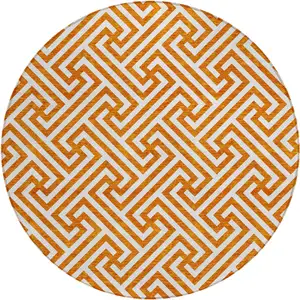 Photo of 8' Orange And Ivory Round Geometric Washable Indoor Outdoor Area Rug