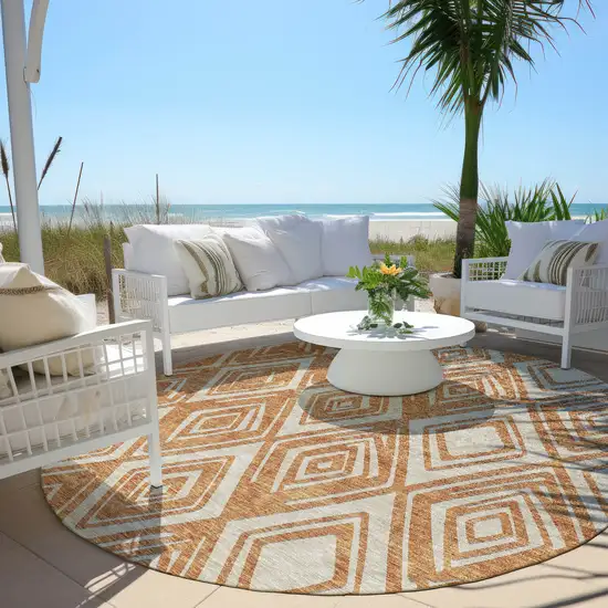 8' Orange And Ivory Round Geometric Washable Indoor Outdoor Area Rug Photo 7