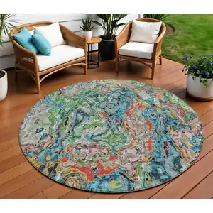 Photo of 8' Orange And Teal Blue Round Abstract Washable Indoor Outdoor Area Rug