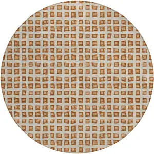 Photo of 8' Orange Beige And Copper Round Geometric Washable Indoor Outdoor Area Rug