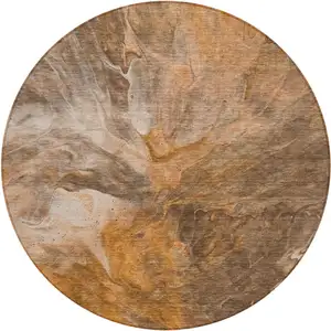 Photo of 8' Orange Copper And Terra Cotta Round Abstract Washable Indoor Outdoor Area Rug