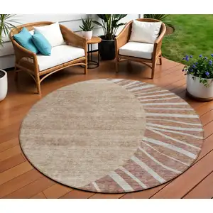 Photo of 8' Orange Copper And Terra Cotta Round Abstract Washable Indoor Outdoor Area Rug