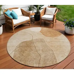 Photo of 8' Orange Copper And Terra Cotta Round Abstract Washable Indoor Outdoor Area Rug