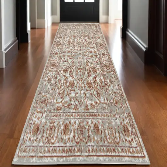 10' Rust and Gray Floral Power Loom Runner Rug Photo 1