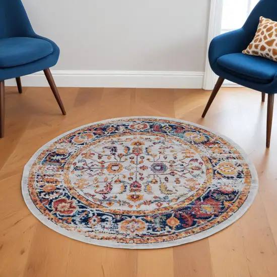 6' Ivory Navy and Orange Floral Power Loom Round Rug Photo 1