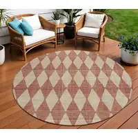 Photo of 8' Orange Round Geometric Washable Indoor Outdoor Area Rug