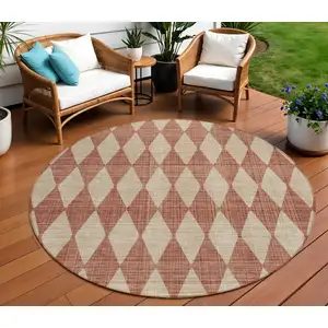 Photo of 8' Orange Round Geometric Washable Indoor Outdoor Area Rug