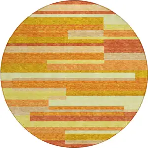 Photo of 8' Orange Salmon And Lime Green Round Striped Washable Indoor Outdoor Area Rug