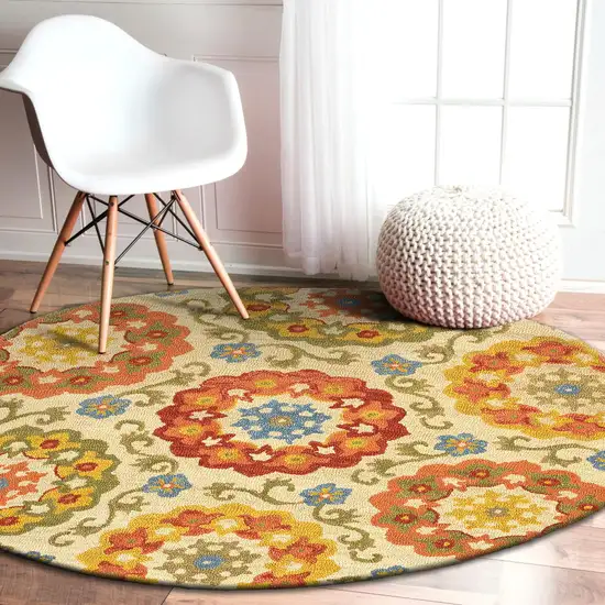 6' Orange and Ivory Round Wool Floral Hand Tufted Area Rug Photo 9