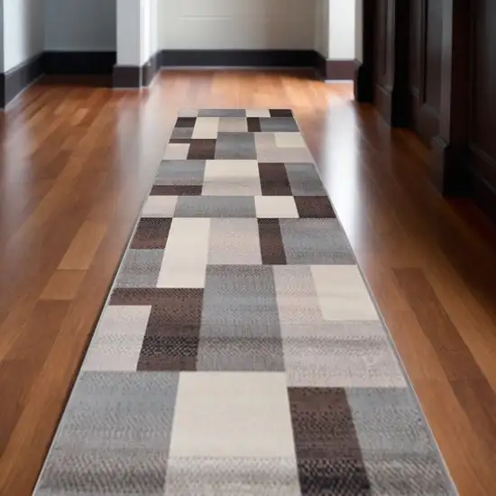 12' Grey-Brown Patchwork Stain Resistant Runner Rug Photo 1