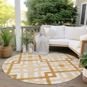 Photo of 8' Peach Orange And Ivory Round Geometric Washable Indoor Outdoor Area Rug