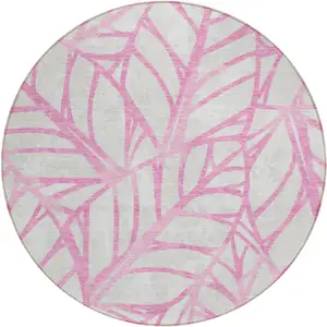 Photo of 8' Pink And Beige Round Floral Washable Indoor Outdoor Area Rug