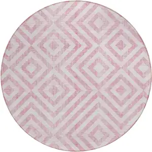 Photo of 8' Pink And Ivory Round Geometric Washable Indoor Outdoor Area Rug