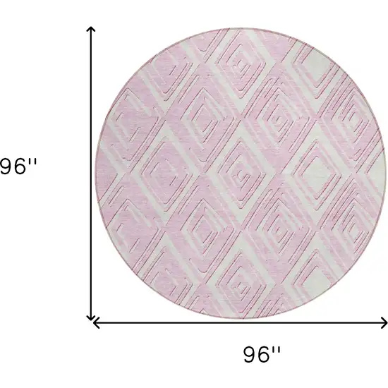 8' Pink And Ivory Round Geometric Washable Indoor Outdoor Area Rug Photo 3