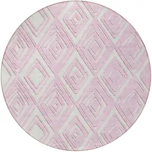 Photo of 8' Pink And Ivory Round Geometric Washable Indoor Outdoor Area Rug