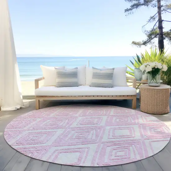 8' Pink And Ivory Round Geometric Washable Indoor Outdoor Area Rug Photo 9