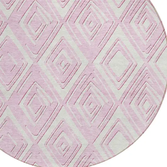 8' Pink And Ivory Round Geometric Washable Indoor Outdoor Area Rug Photo 6