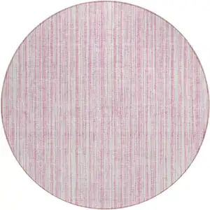 Photo of 8' Pink And Ivory Round Striped Washable Indoor Outdoor Area Rug