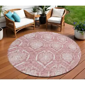 Photo of 8' Pink Blush And Ivory Round Medallion Washable Indoor Outdoor Area Rug