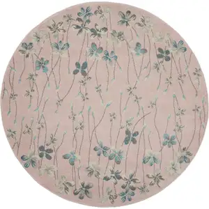 Photo of 5' Pink Gray and Blue Botanical Leaves Round Rug