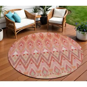 Photo of 8' Pink Salmon And Blush Round Southwestern Washable Indoor Outdoor Area Rug