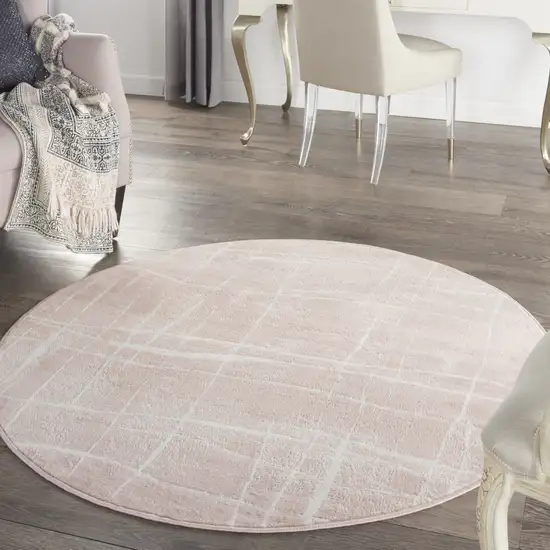 5' Pink and Ivory Abstract Geometric Round Rug Photo 9