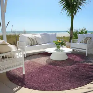 Photo of 8' Plum Mauve And Beige Round Abstract Washable Indoor Outdoor Area Rug