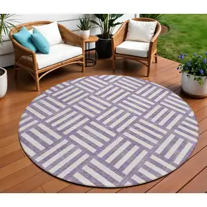 Photo of 8' Purple And Ivory Round Geometric Washable Indoor Outdoor Area Rug