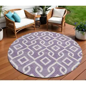 Photo of 8' Purple And Ivory Round Geometric Washable Indoor Outdoor Area Rug