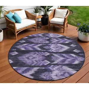 Photo of 8' Purple Lavender And Plum Round Southwestern Washable Indoor Outdoor Area Rug