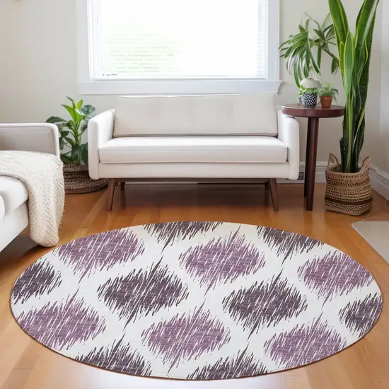 8' Purple Plum And Ivory Round Ikat Washable Indoor Outdoor Area Rug Photo 8