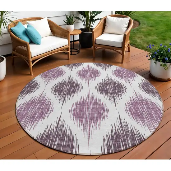 8' Purple Plum And Ivory Round Ikat Washable Indoor Outdoor Area Rug Photo 1