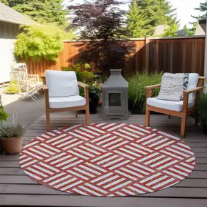 Photo of 8' Red And Ivory Round Geometric Washable Indoor Outdoor Area Rug