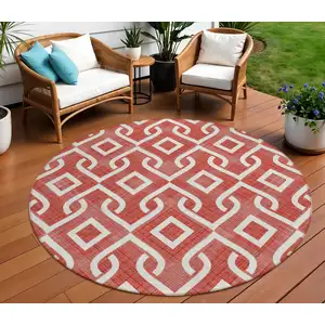 Photo of 8' Red And Ivory Round Geometric Washable Indoor Outdoor Area Rug