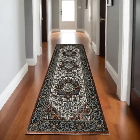 8' Red Black And White Medallion Runner Rug With Fringe Photo 1