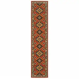 Photo of 12' Red Gold Blue Brown Oriental Power Loom Runner Rug With Fringe