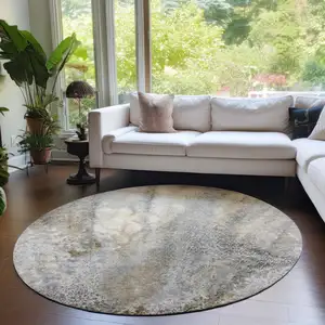 Photo of 8' Round Beige Round Abstract Washable Non Skid Indoor Outdoor Area Rug