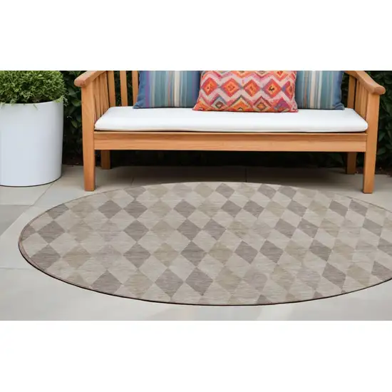 Beige Taupe and Brown Round Geometric Washable Non Skid Indoor Outdoor Area Rug Photo 1