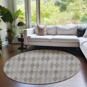 Photo of 8' Round Beige Taupe and Brown Round Geometric Washable Non Skid Indoor Outdoor Area Rug