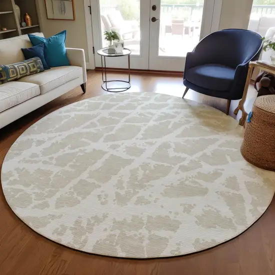 8' Round Beige and Ivory Round Abstract Washable Non Skid Indoor Outdoor Area Rug Photo 9