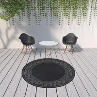 Photo of 8' Round Black Round Stain Resistant Indoor Outdoor Area Rug