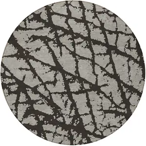 Photo of 8' Round Black and White Round Abstract Washable Non Skid Indoor Outdoor Area Rug