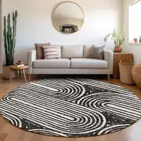 Photo of 8' Round Black and White Round Abstract Washable Non Skid Indoor Outdoor Area Rug