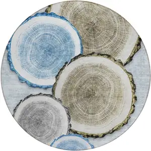 Photo of 8' Round Blue Gold and Gray Round Faux Bois Washable Non Skid Indoor Outdoor Area Rug