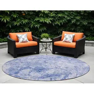 Photo of 8' Round Blue Round Abstract Washable Non Skid Indoor Outdoor Area Rug