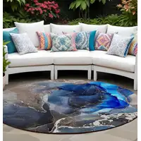 Photo of 8' Round Blue Round Abstract Washable Non Skid Indoor Outdoor Area Rug